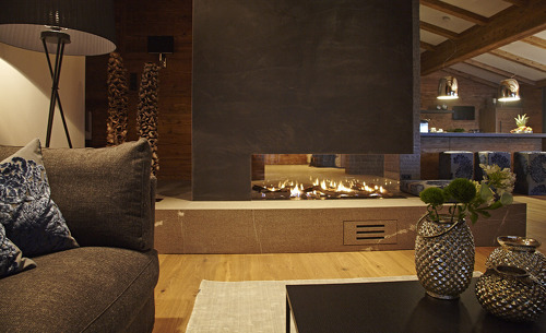 Chaletflair im Allgäu - Wohnraum mit Kamin