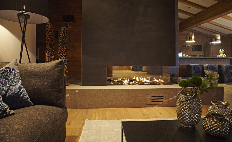 Chaletflair im Allgäu - Wohnraum mit Kamin