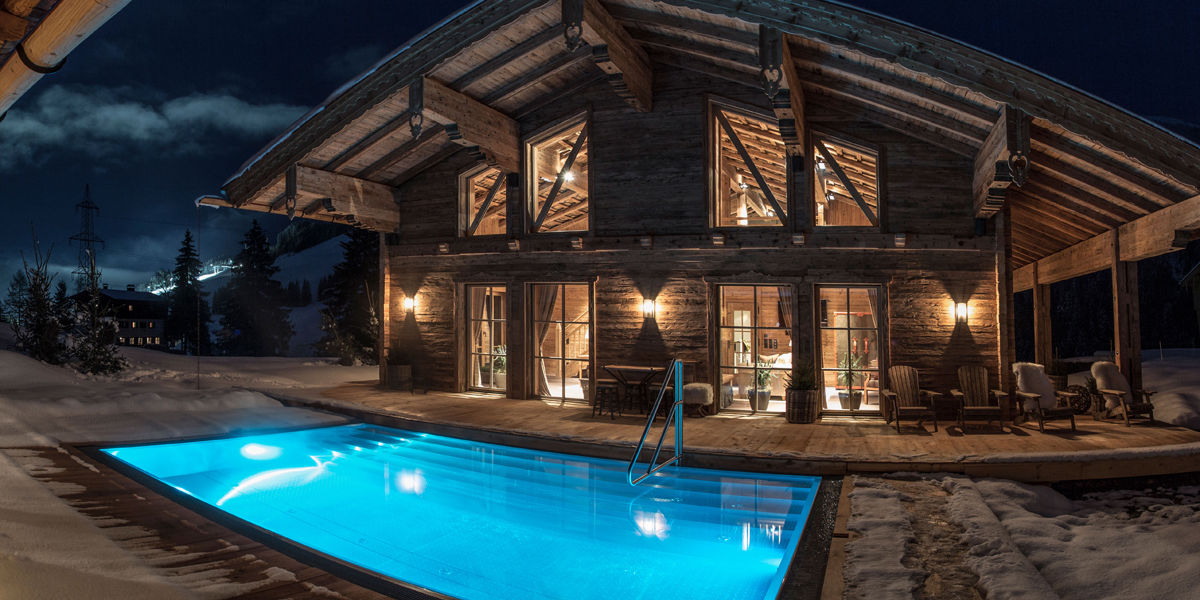 Tauchen Sie ein in das beheizte Außenbecken Ihres privaten Luxus Chalets- die Schmiedalm Tauchen Sie ein in das beheizte Außenbecken Ihres privaten Luxus Chalets- die Schmiedalm